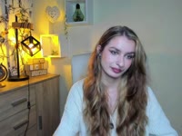 Hey, I’m Nina – blonde hair, green eyes, and tattoos that love to tell their own stories. My taste in music? Somewhere between Doja Cat’s groove and Rammstein’s fire ? I adore singing, dancing, and just vibing with the right energy. Sometimes I’m your sweet daydream, sometimes your wild rock chick – depends on which song is playing ?